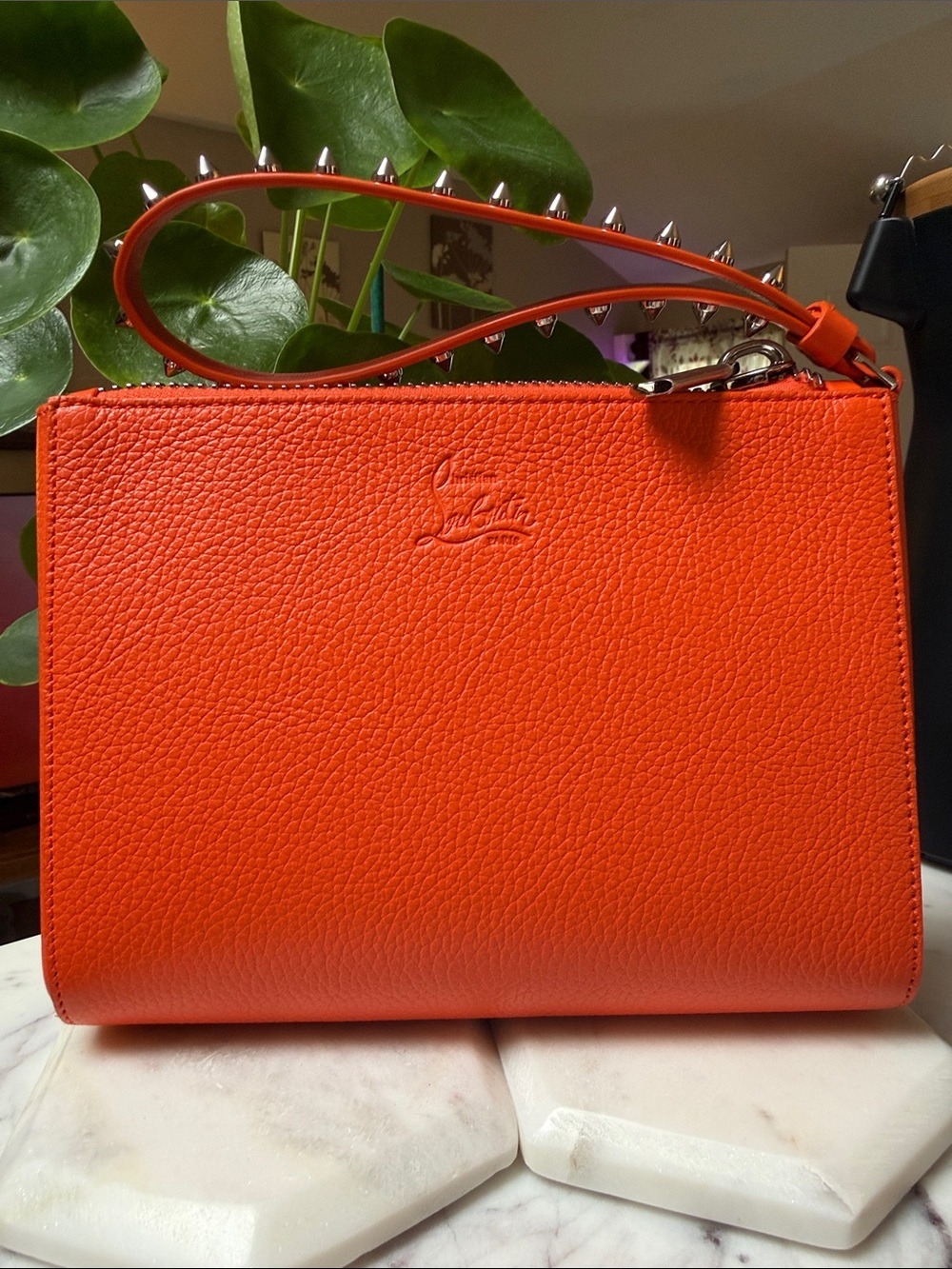 Christian Louboutin Orange Pebbled Leather Wristlet with Spiked Strap